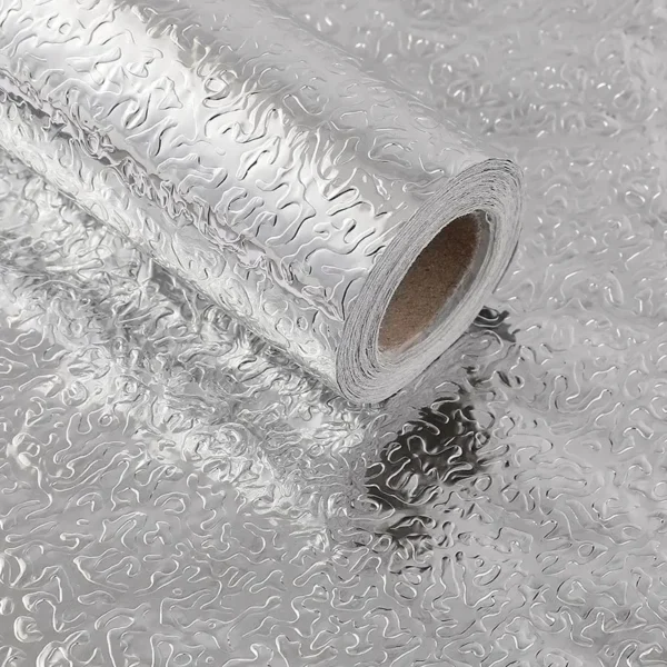 Roll of 40cm wide aluminum foil kitchen sticker applied on countertop edge