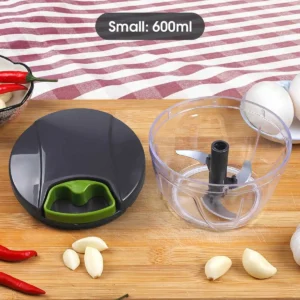 Manual pull string food chopper with transparent bowl and blades inside