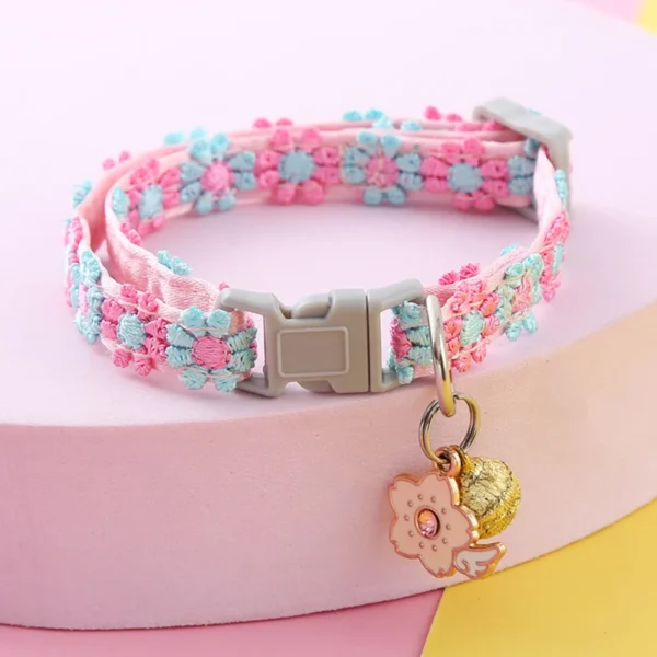 Adjustable colorful pet collar decorated with cartoon footprints and attached safety bell
