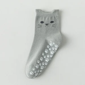 Mid-calf women's cotton yoga sock in blue with non-slip sole