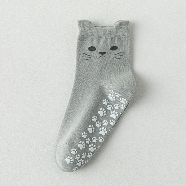 Mid-calf women's cotton yoga sock in blue with non-slip sole