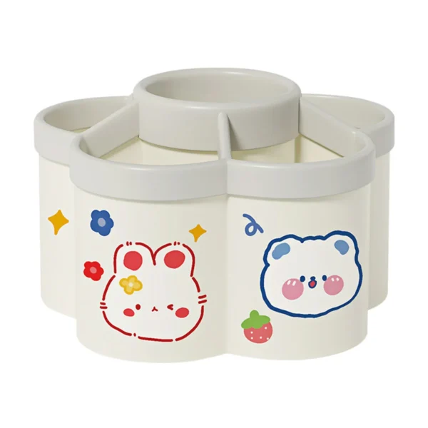 Rotating desk organizer with multiple compartments and random stickers displayed on a desk