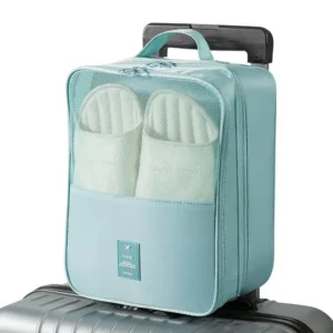 Soft polyester shoe bag holding three pairs of shoes in blue color