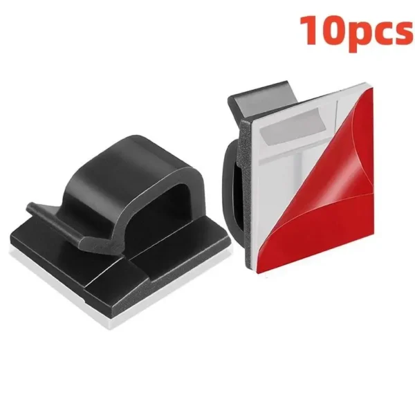 Pack of self-adhesive cable clips arranged on white background with earphone and mouse cables