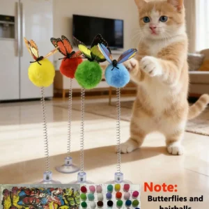 Suction cup spring cat teaser toy attached to glass surface