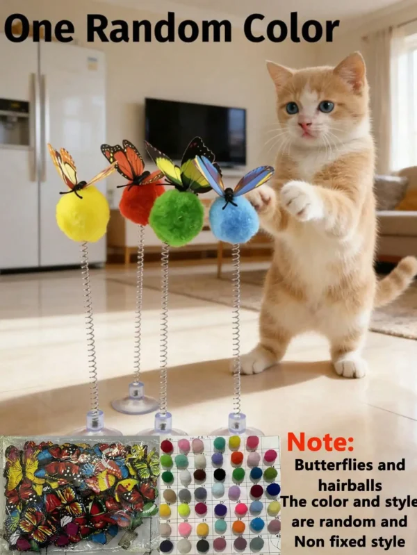 Suction cup spring cat teaser toy attached to glass surface