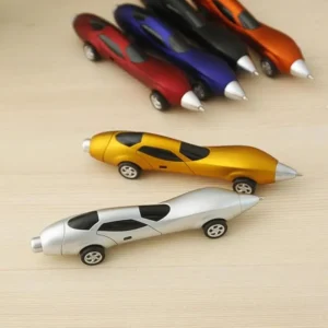 Car-shaped blue plastic ballpoint pen on white background
