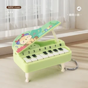 Mini handheld glowing electronic piano keychain in assorted colors attached to a keyring