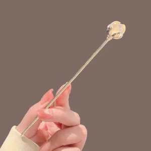 VANIKA crystal lotus metal hair stick with geometric design on a white background