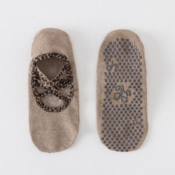 Leopard pattern women's yoga socks with cross straps and anti-slip soles in black color