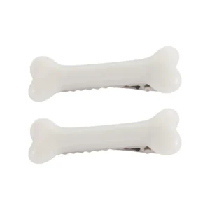 Two black and white geometric dog bone shaped acrylic hair clips