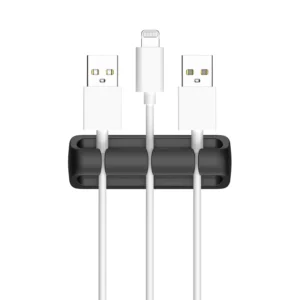 Desktop cable organizer holding multiple charging and data cables on a tabletop
