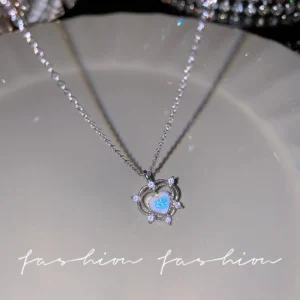 Necklace with crystal bow and angel wings heart pendant on clavicle chain