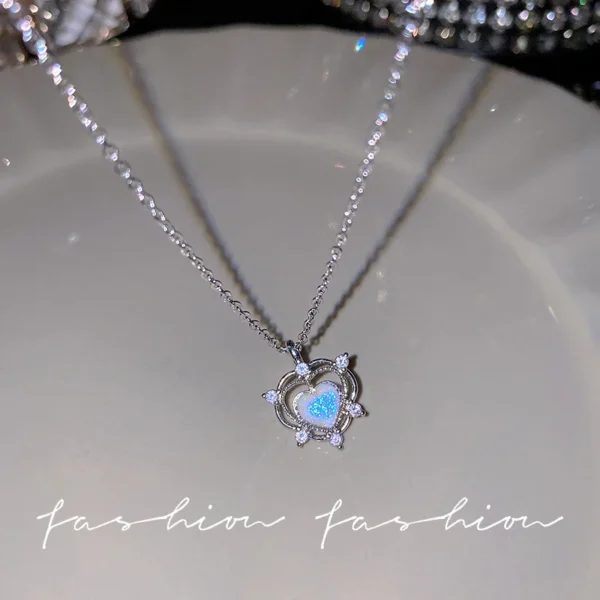 Necklace with crystal bow and angel wings heart pendant on clavicle chain