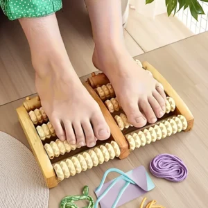 Wooden foot massager with multiple rollers on a white background