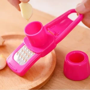 Manual garlic press crusher kitchen tool with handle and crushing chamber