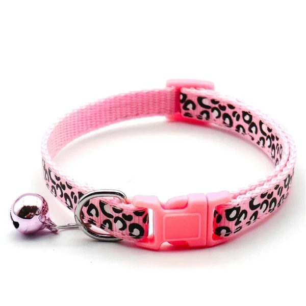Adjustable pet collar with leopard print and jingle bell on white background