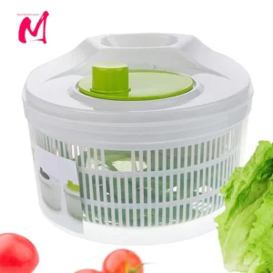 Manual salad spinner with basket and outer bowl for washing and drying leafy greens