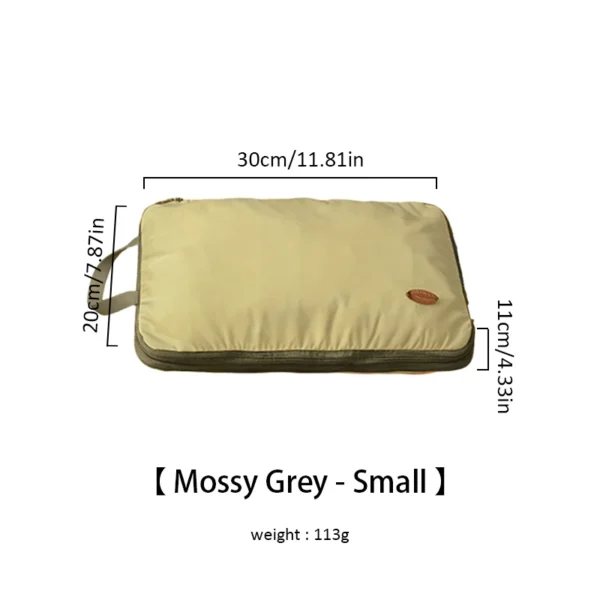 Blue and gray nylon compression storage bags with handle, 42 by 11 centimeters