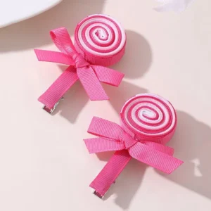 Two lollipop bow hair clips with ribbon and spiral candy design in assorted colors
