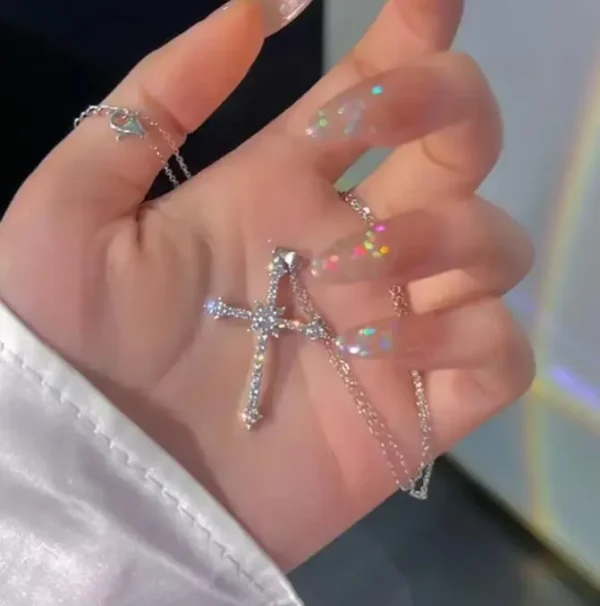 Pink crystal cross pendant necklace on chain