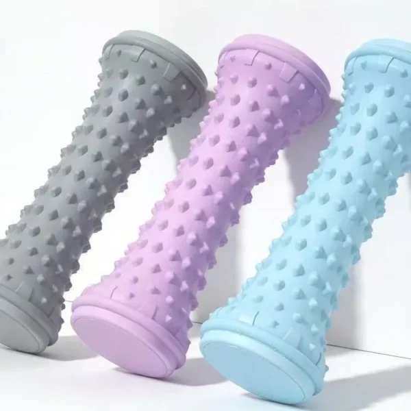 Gray portable yoga massage ball and plantar fascia roller for foot muscle relief