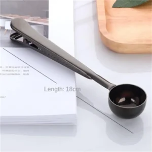 Black stainless steel coffee scoop with built-in sealing clip
