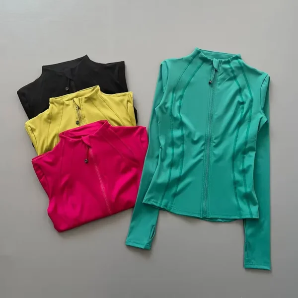 Women's slim fit full zip athletic jacket with long sleeves and thumb holes in multiple colors